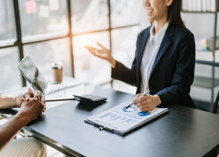 startup business, business advisor leadership for planning finance investment teamwork paperwork audit and discussing marketing, profit, budget of company in meeting room.